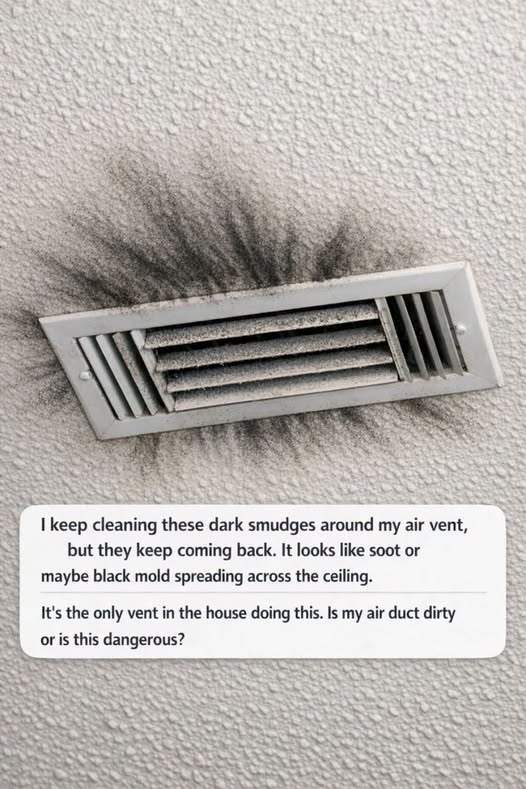 I keep cleaning these dark smudges around my air vent, but they keep coming back. It looks like soot or maybe black mold spreading across the ceiling. It’s the only vent in the house doing this. Is